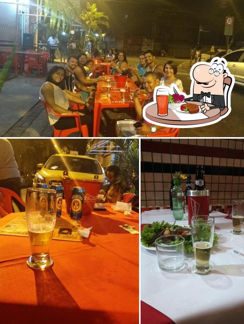 Entre diferentes coisas, mesa de jantar e cerveja podem ser encontrados no Toka do 34 Restaurante