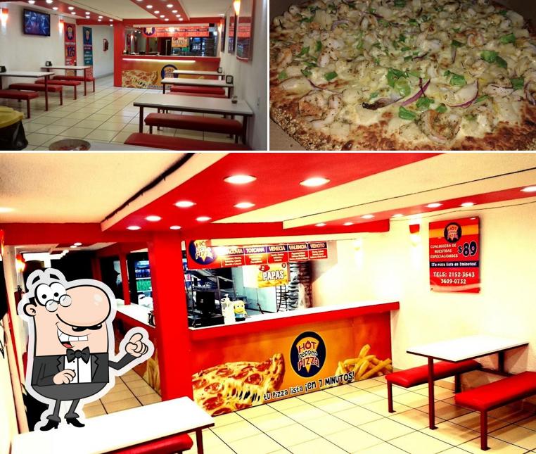 The photo of Hot Pepper Pizza’s interior and pizza