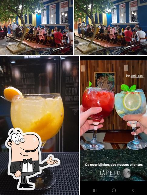 A ilustração do Jápeto Bar e Restaurante’s interior e bebida