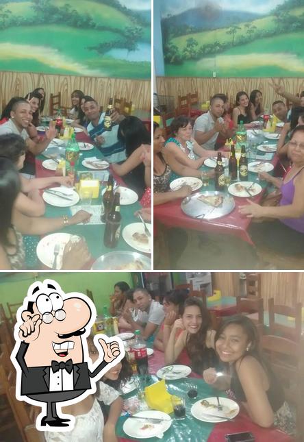 O interior do Pizzaria Ideal contagem