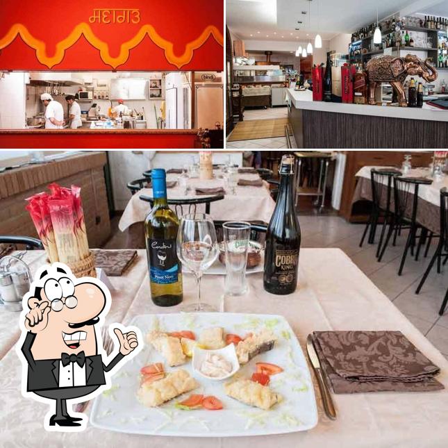 La foto di interni e vino da Ristorante Pizzeria Hotel Grillo Verde