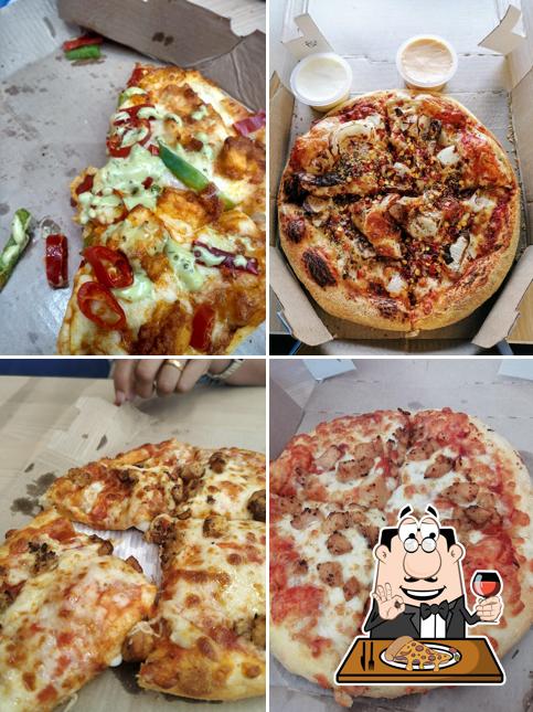 Pick pizza at Domino's Pizza