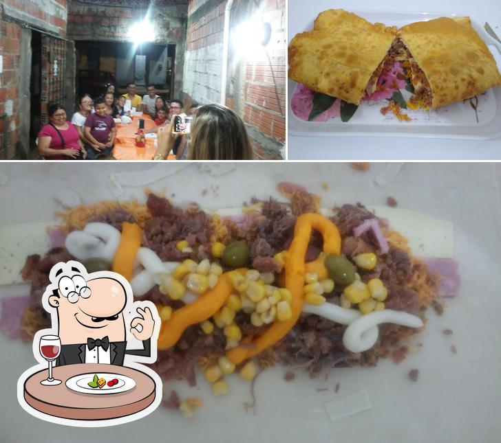 A foto do Pastelaria JM’s comida e interior