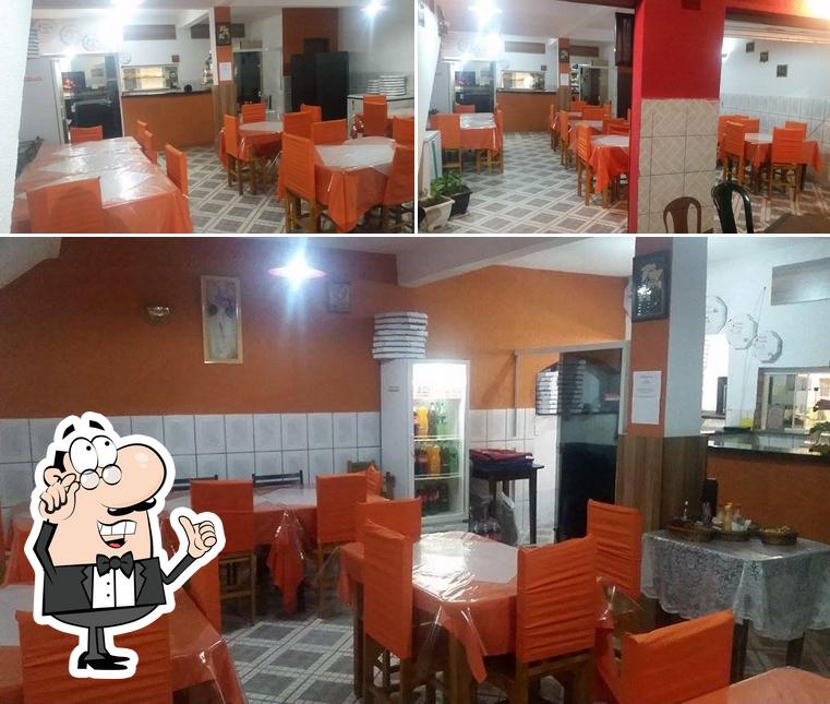 O interior do Pizzaria Victória