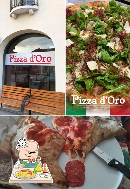 Pizza D'oro si caratterizza per la cibo e interni