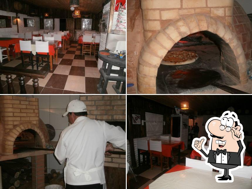 O interior do Pizzaria MAMA DITA