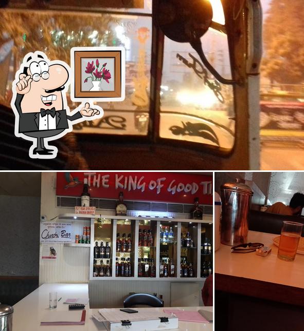 Among various things one can find interior and alcohol at Chandni Bar And Restaurant