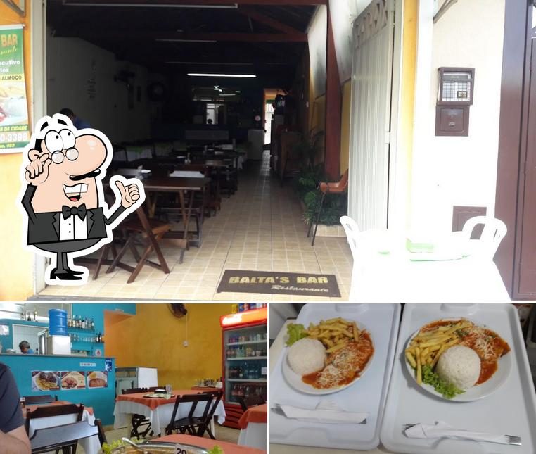 Confira a imagem ilustrando interior e comida a Baltasbar O Parmegiana