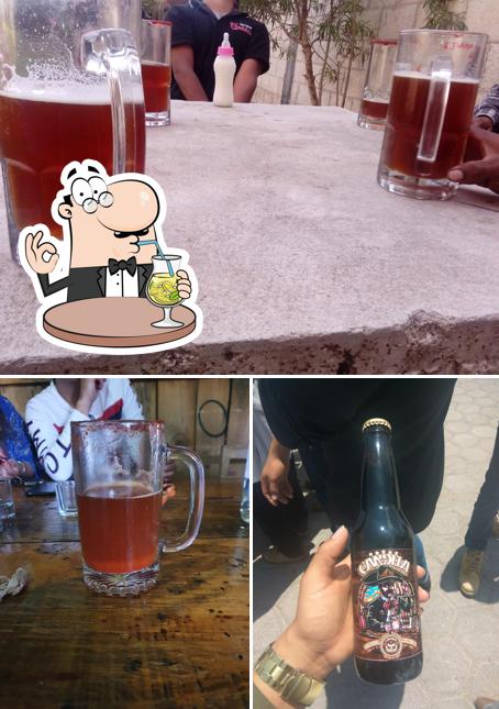 This is the picture displaying drink and food at CONSORCIO CERVECERO CANDELA