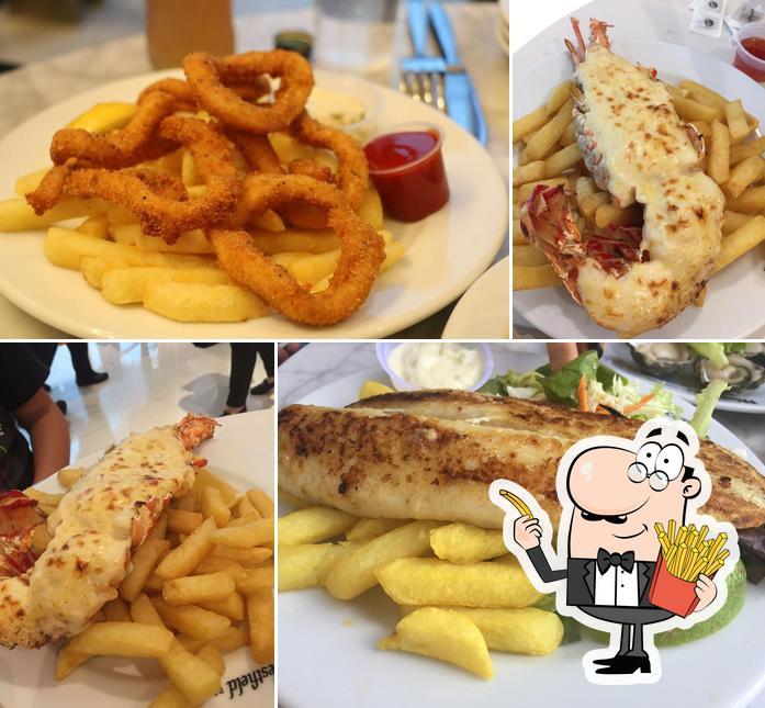 Try out French fries at Lobster Tail Seafood Restaurant