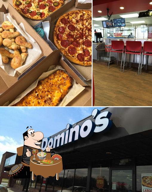 Take a look at the picture depicting food and interior at Domino's Pizza
