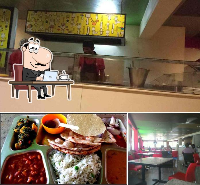Check out the image showing interior and food at Yummy Tummy