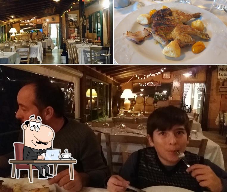 Questa è la immagine che presenta la interni e cibo di Osteria Il Vignaccio
