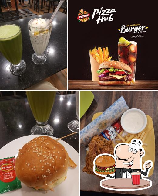 Try out a burger at PIZZA HUB
