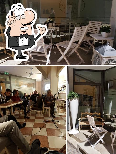 Dai un'occhiata agli interni di Le Cafe Do Re Mi