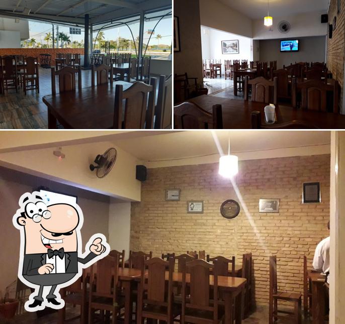 Veja imagens do interior do Toca do Robalo Restaurante e Pizzaria