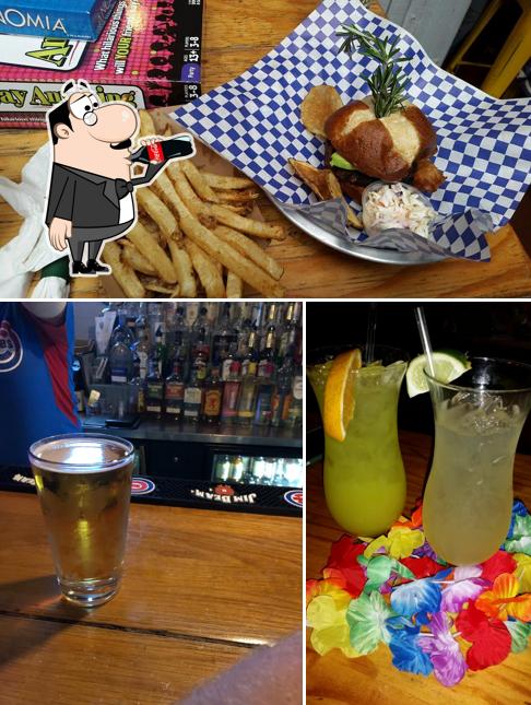 The photo of drink and food at Trader Todd's