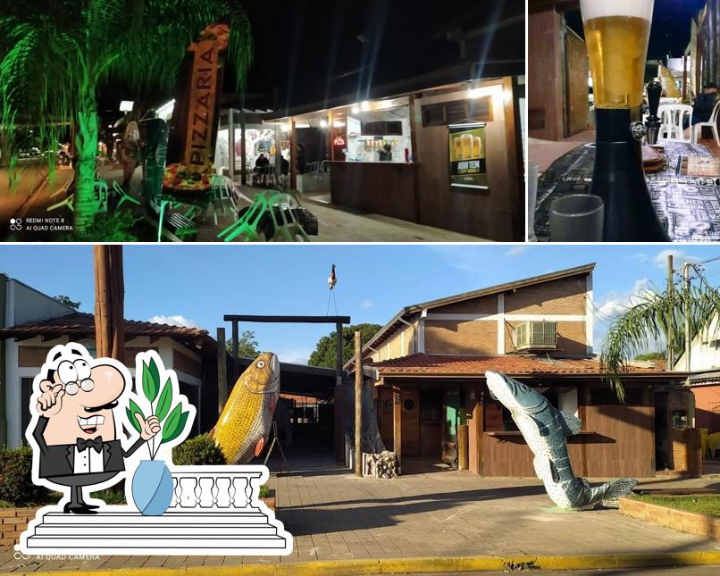 Dê uma olhada a foto ilustrando exterior e cerveja a Pizzaria Itália