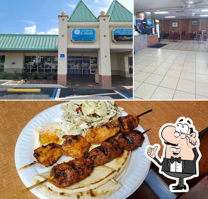 Among various things one can find interior and exterior at Gyros & More Greek Restaurant II