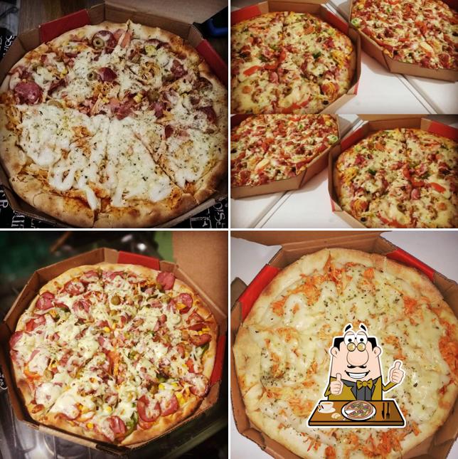 No Ponto Mineiro Pizzaria e Lanchonete, você pode conseguir pizza