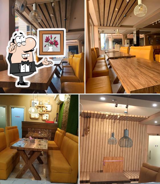 Take a seat at one of the tables at Royal Family Restaurant
