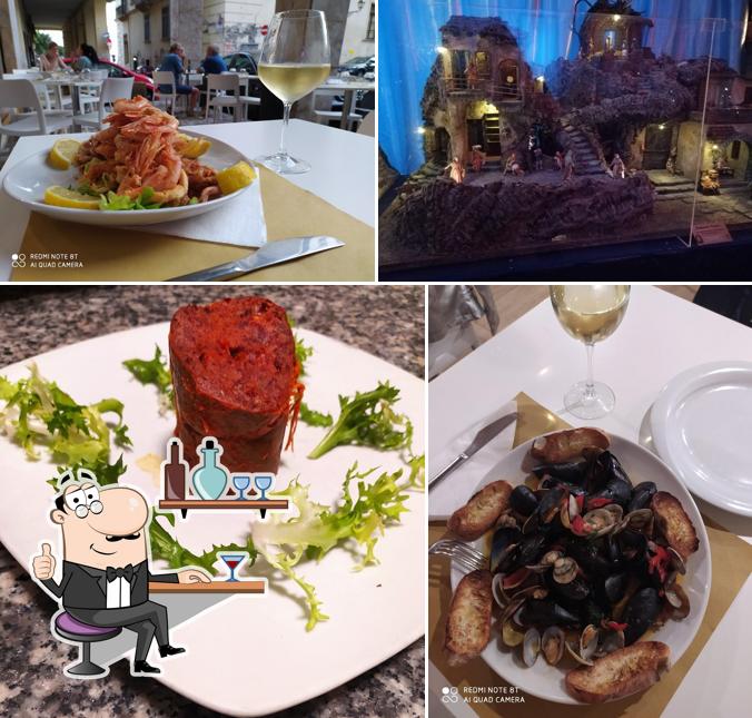 Siediti a un tavolo di Stella Maris hosteria -pizzeria