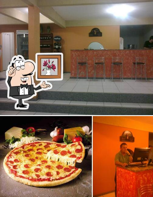 A imagem da interior e pizza no Chico's Pizzas