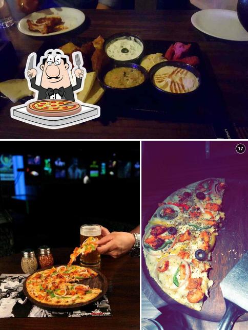 Order pizza at Underdoggs Sports Bar & Grill