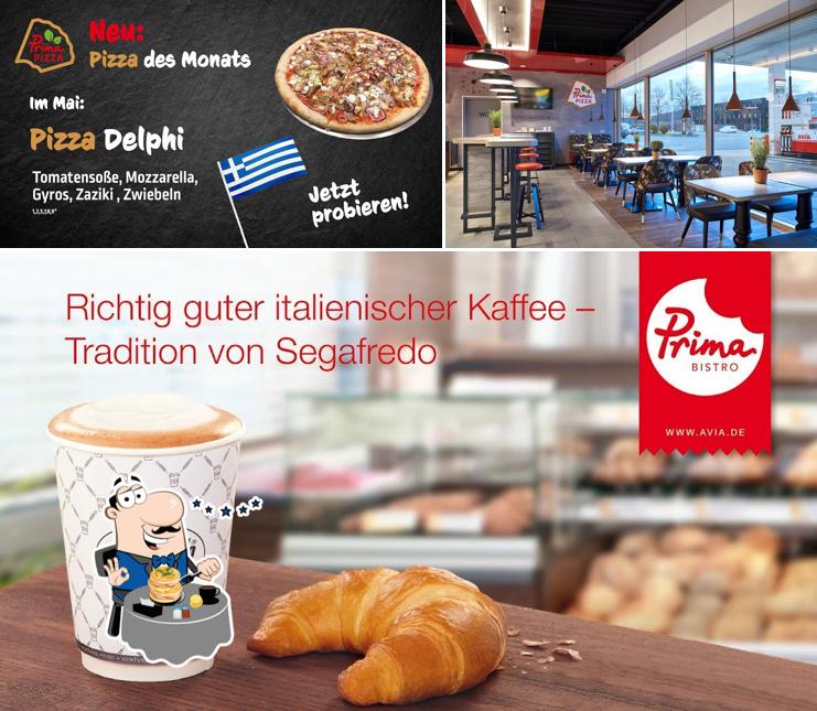 Mira las imágenes que muestran comida y interior en Prima Pizza