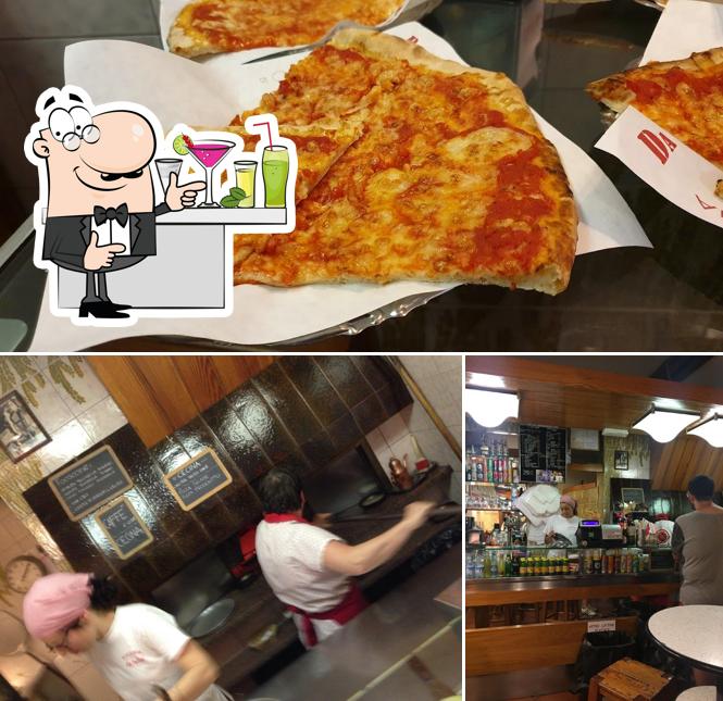 Dai un’occhiata alla immagine che mostra la bancone da bar e pizza di Pizzeria Da Felice