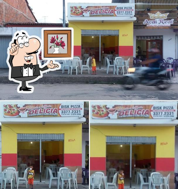 O interior do Pizzaria Delicia 1