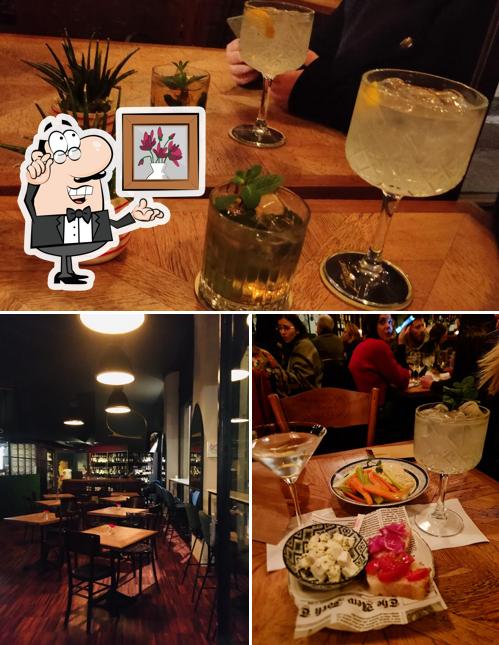 La immagine della interni e cibo di La Santa Wine & Spirits Torino