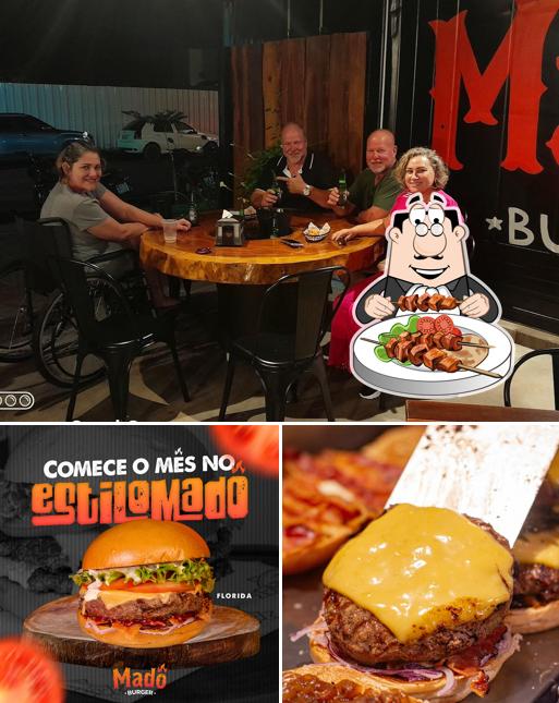 A ilustração da comida e mesa de jantar no Madô Burger Delivery - Hamburgeria Sinop MT