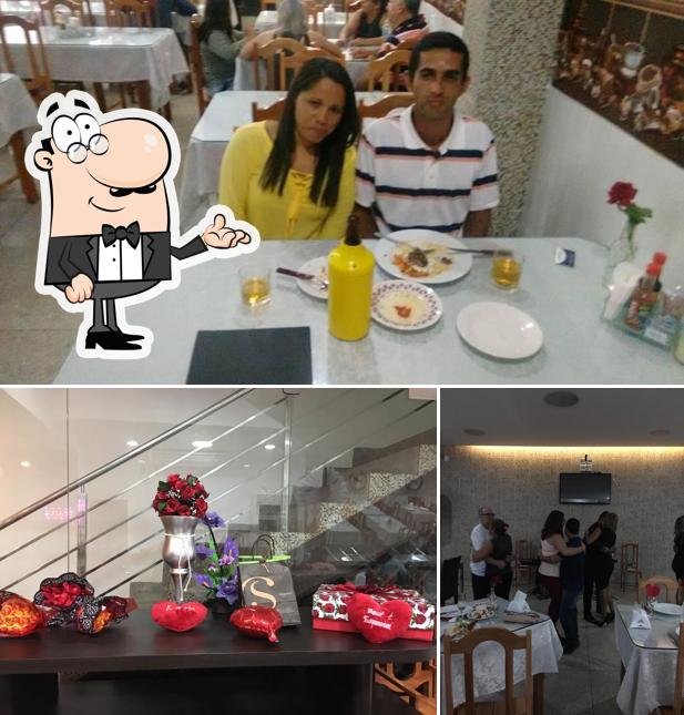 O interior do Pizzaria e Hamburgueria Santos Dumont