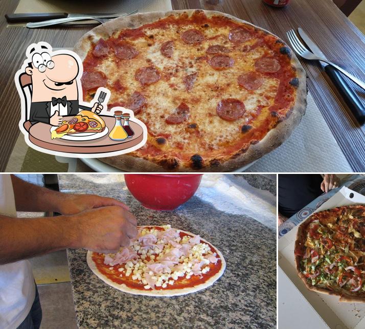 A Rosticceria Del Re, puoi assaggiare una bella pizza