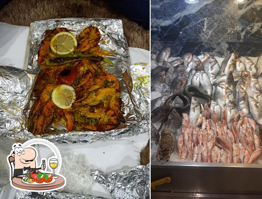 Order seafood at Kadoura restaurant Zayed - قدورة فرع زايد