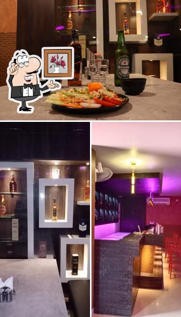This is the image showing interior and beer at ATHARVA BAR & RESTUARENT