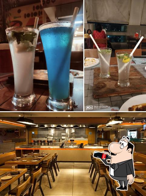 Check out the photo showing drink and interior at Barbeque Nation - Pune - Wakad