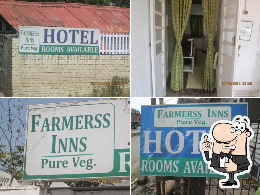 Look at this image of Hotel Farmer's Inn Veg Restaurant And Lodge
