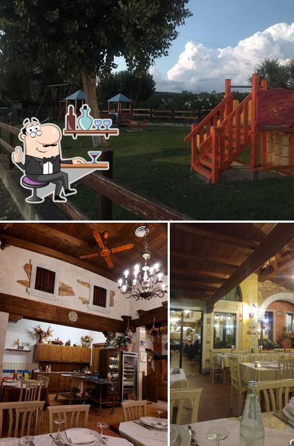 La immagine di interni e area giochi da Trattoria Ai Colli