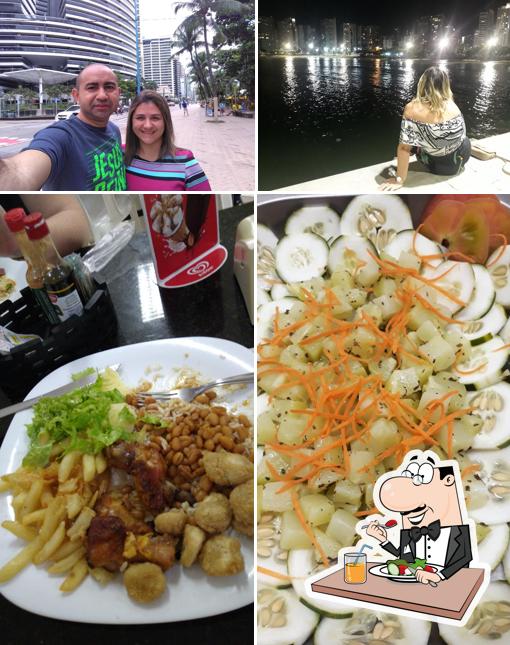 Confira a imagem ilustrando comida e exterior a Bodeguitta