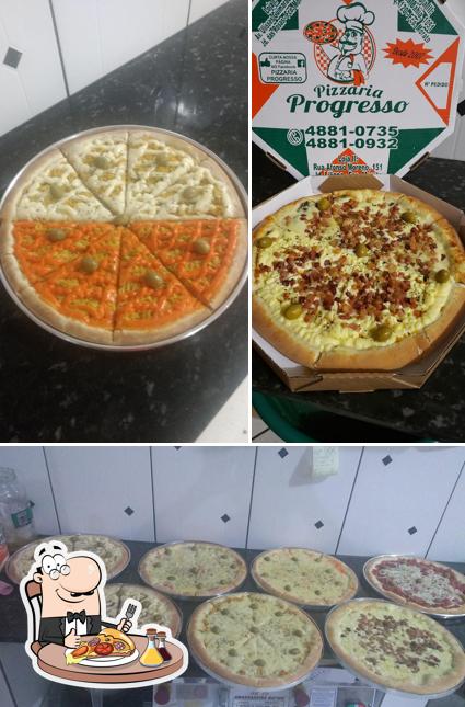 Try out pizza at Pizzaria Progresso - Loja II