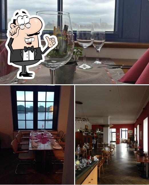 This is the picture showing interior and wine at Homme Dor