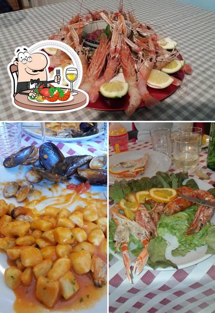 Закажите блюда с морепродуктами в "Hosteria Del Pesce Roma"
