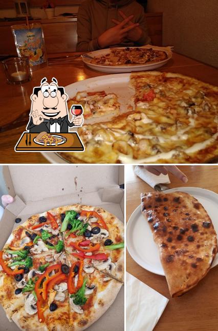 Elige una pizza en Ibo's Döner und Pizza