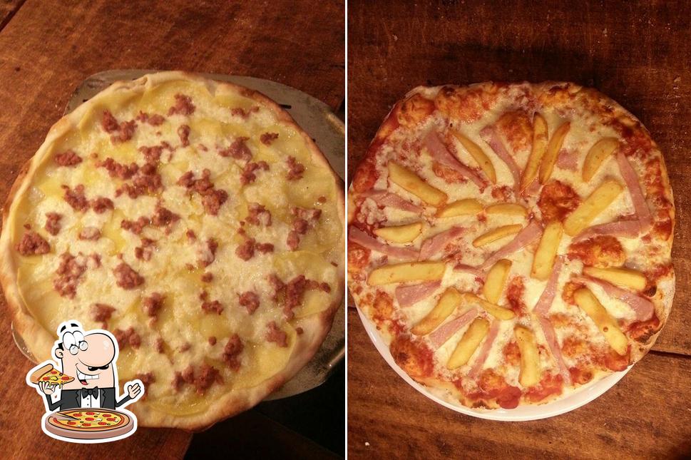 A Pizzeria Pizza Più Collefiorito, puoi provare una bella pizza