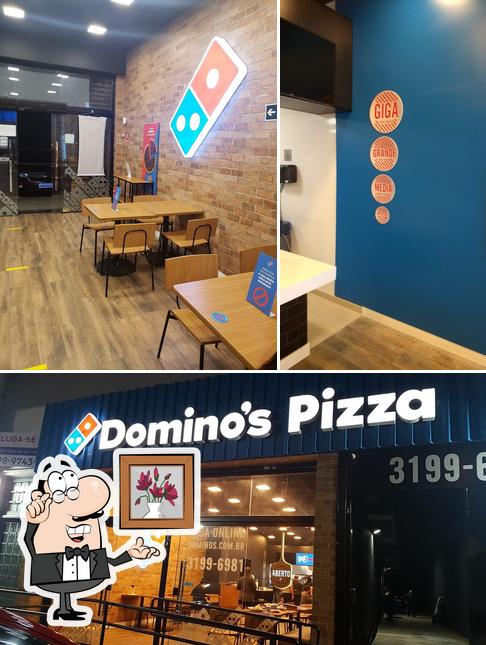 O interior do Domino's Pizza - Vila Mascote