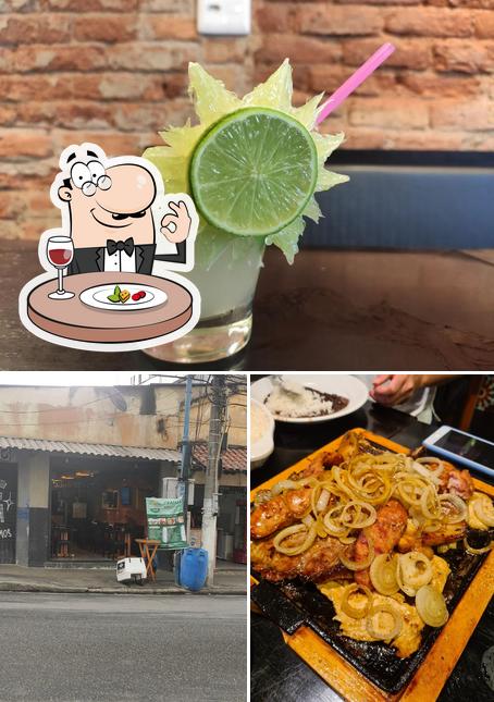 A imagem da comida e exterior no Quitanda Bar