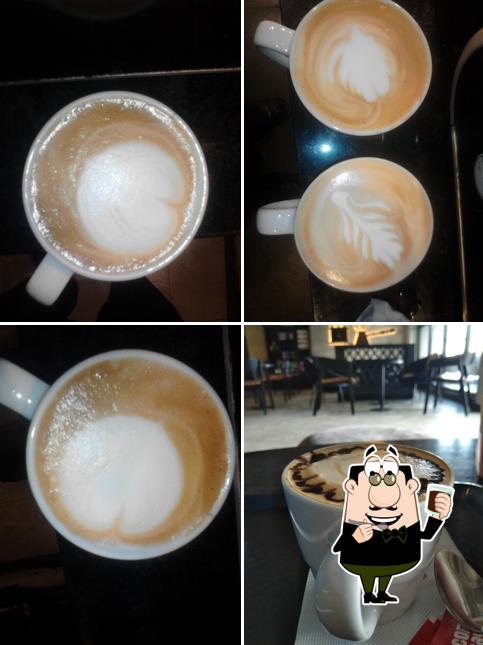 Enjoy a drink at Café Coffee Day