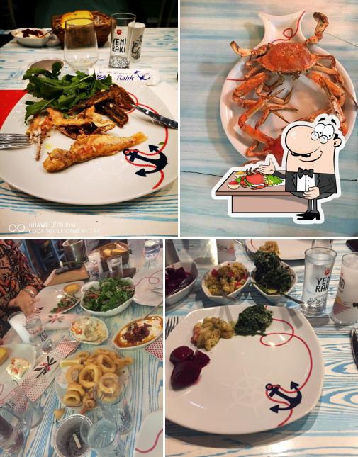 Закажите блюда с морепродуктами в "DERİN BALIK"